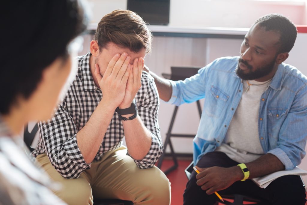 men in a 12-Step recovery group
