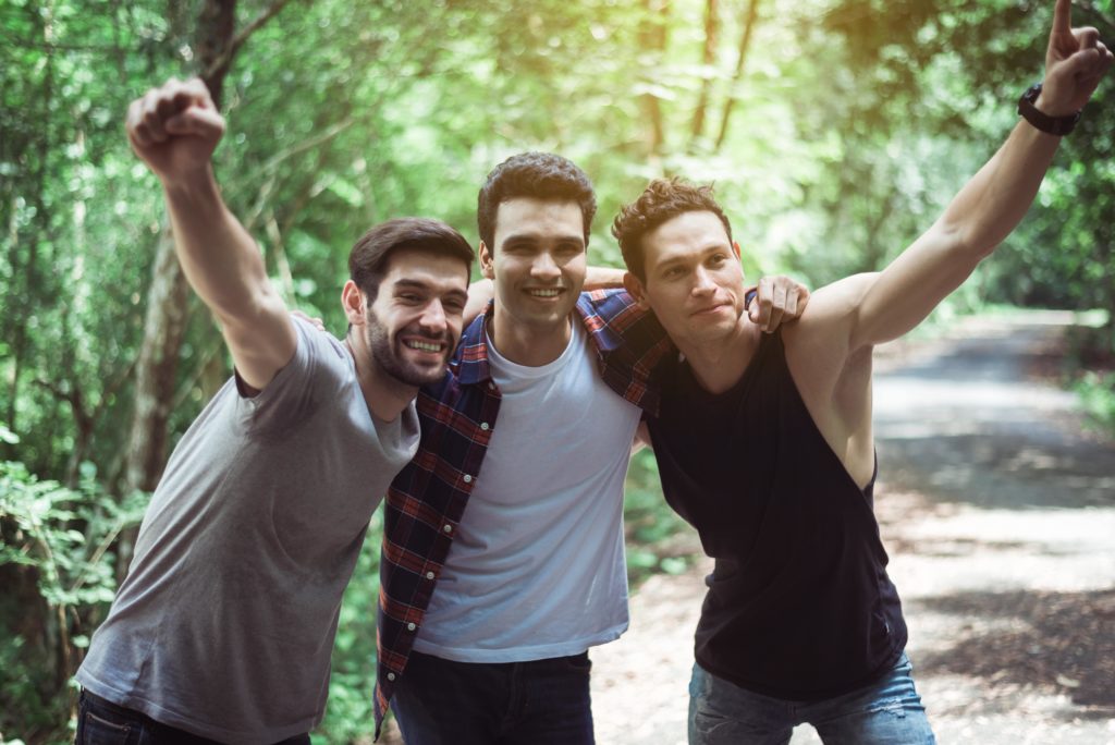 young men together in recovery hiking during long-term addiction treatment in Nashville, TN