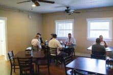 men eating lunch at Discovery Place rehab in Tennessee