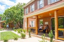 Drug and Alcohol Rehab in Nashville with clients sitting on front porch