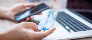 person using credit card for private pay drug rehab